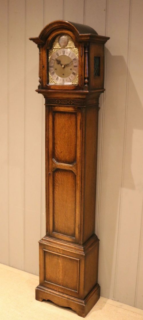 fig 1. Westminster Chime Oak Grandmother Clock