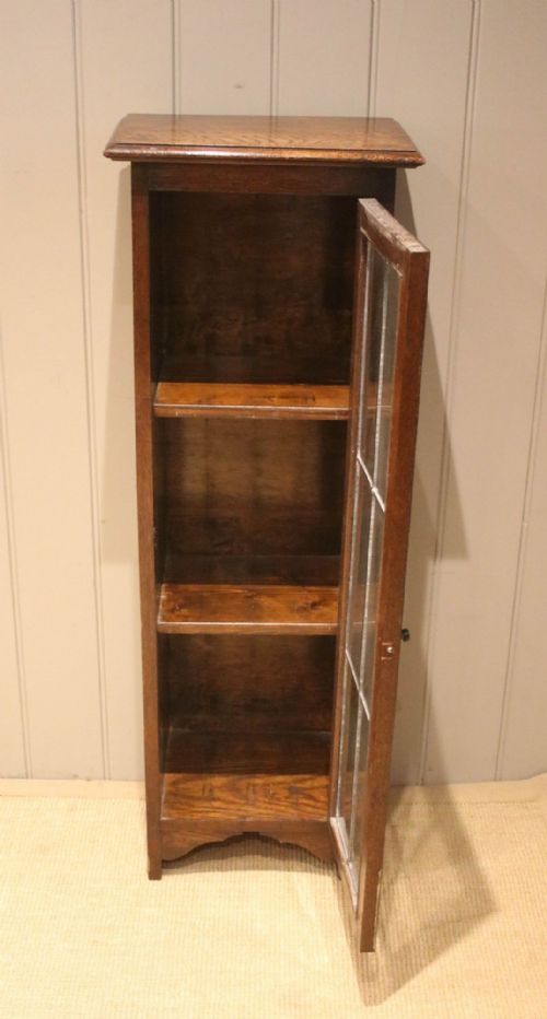 fig 1. Tall Small Proportioned Oak Glazed Bookcase