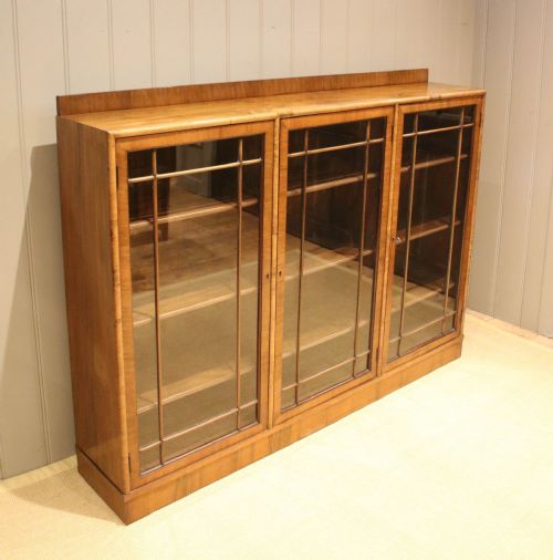fig 1. Long Three Section Walnut Glazed Bookcase