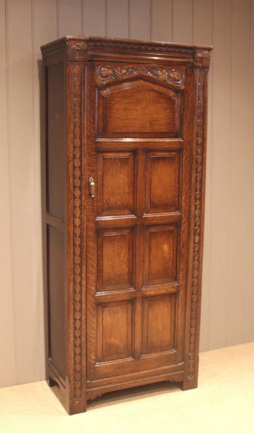 fig 1. Solid Oak Carved Hall Cupboard