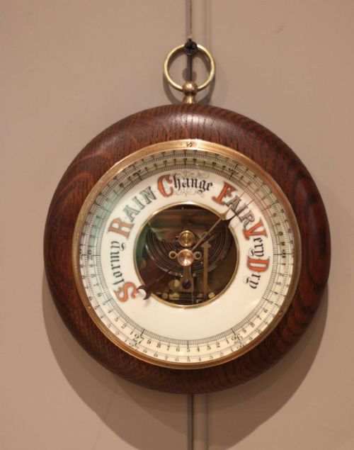 CIRCULAR OAK ANEROID BAROMETER
