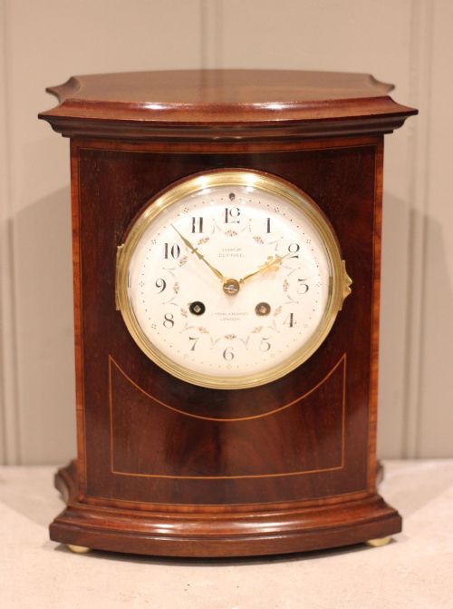 Mahogany & Inlay Bow Front Mantel Clock