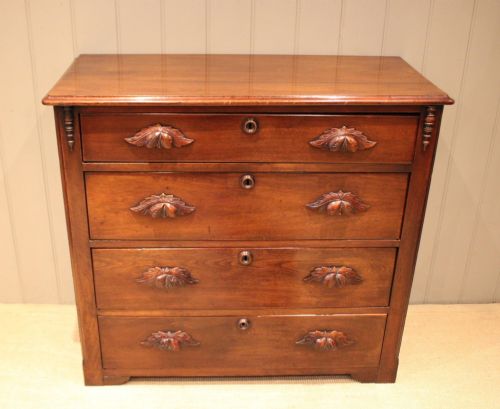 LATE 19TH CENTURY WALNUT CHEST OF DRAWERS