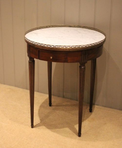 fig 1. Circular Mahogany Marble Top Table