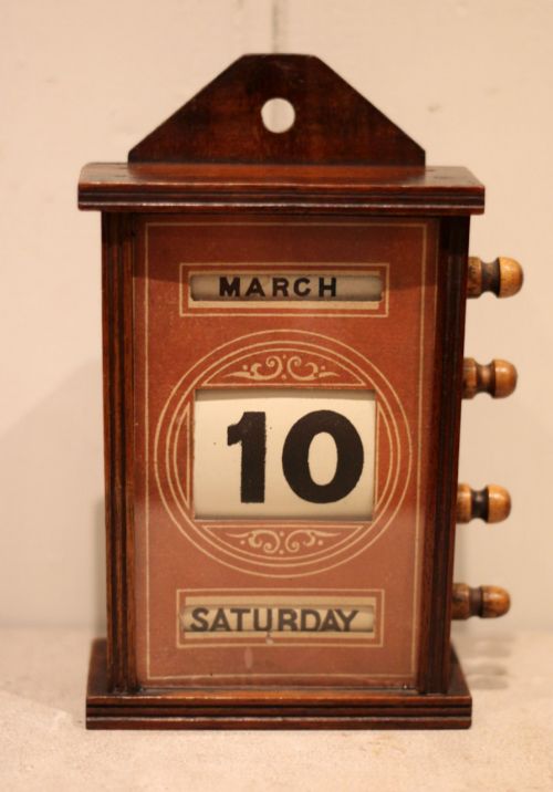 LATE 19TH CENTURY MAHOGANY DESK CALENDAR