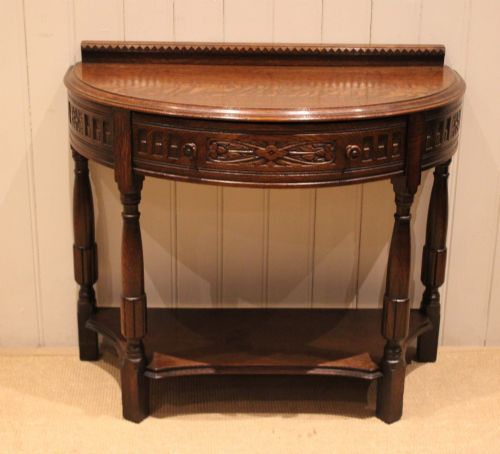 FRENCH CARVED SOLID OAK DEMI LUNE TABLE