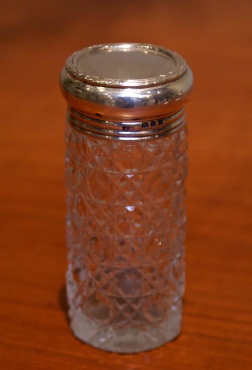 Silver Topped Cut Glass Bottle