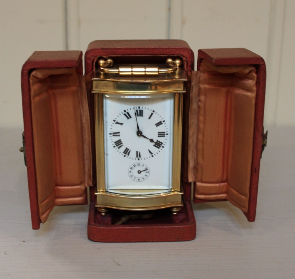 Serpentine Alarm Carriage Clock in a Winged Travel Case 
