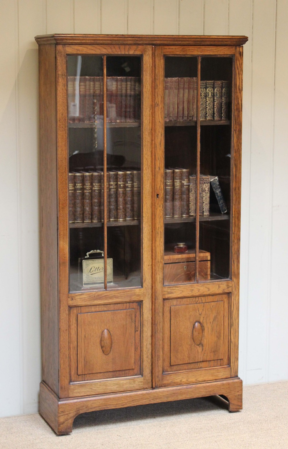 Two Door Part Glazed Oak Bookcase