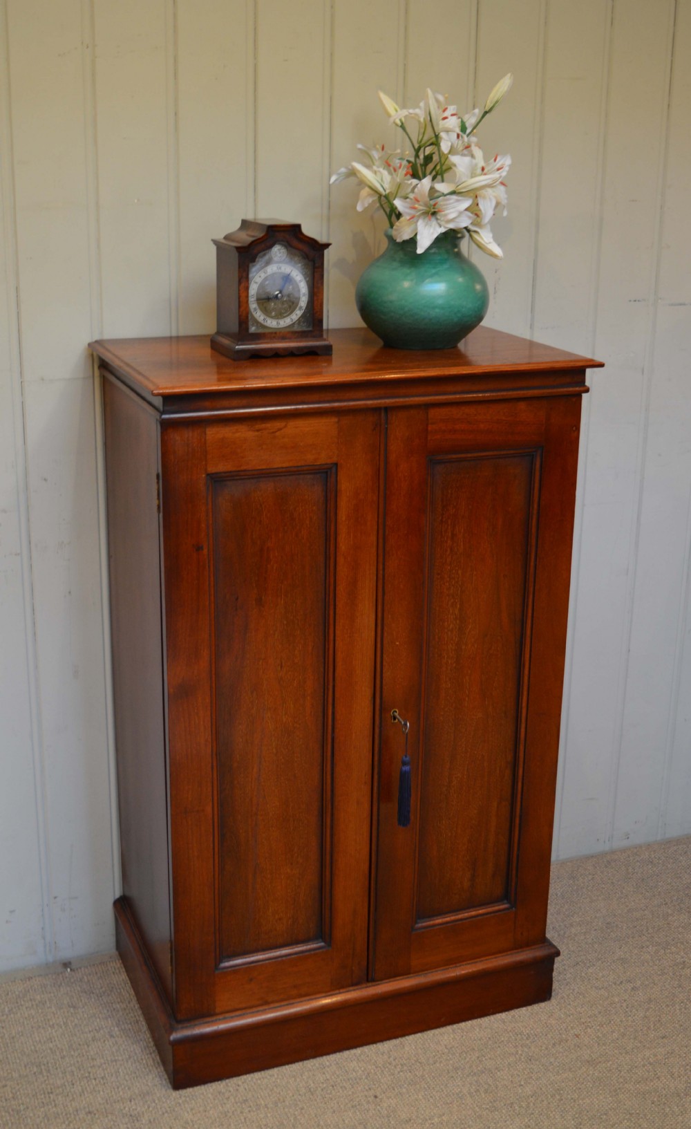 Slim Two Door Mahogany Cabinet