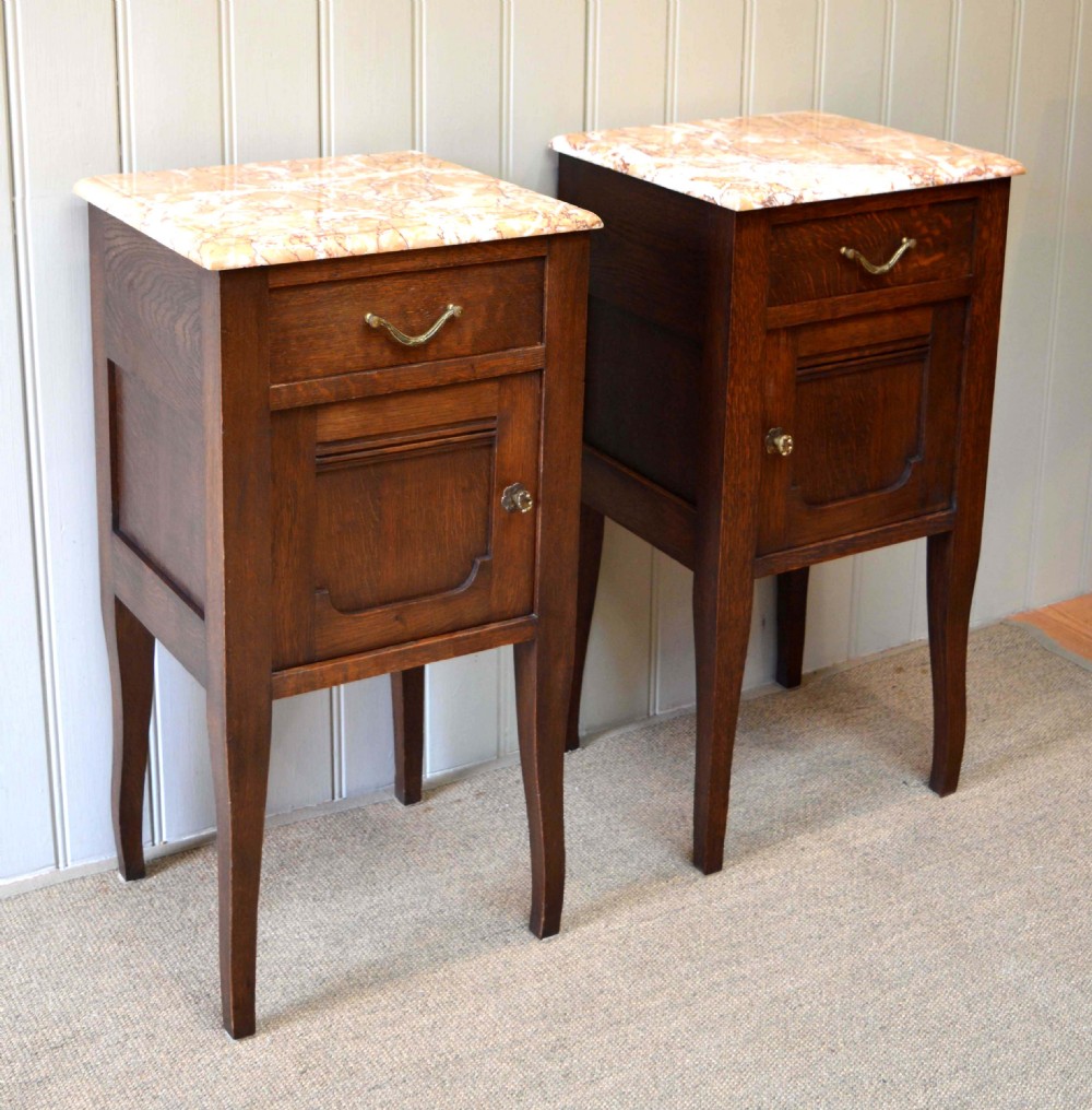Pair of Oak Marble Top Bedside Cabinets