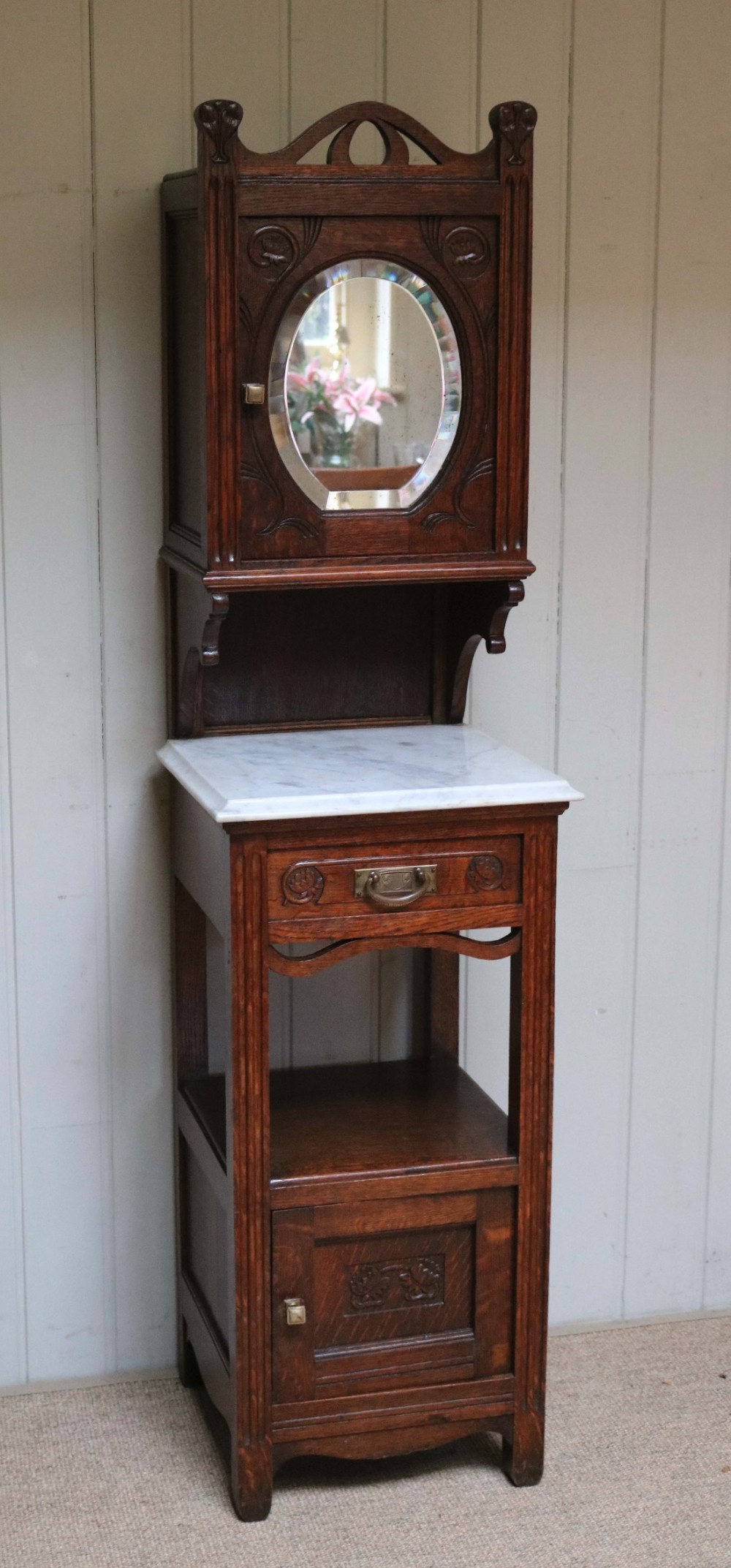 Oak  Cabinet With Mirrored Cupboard Top 