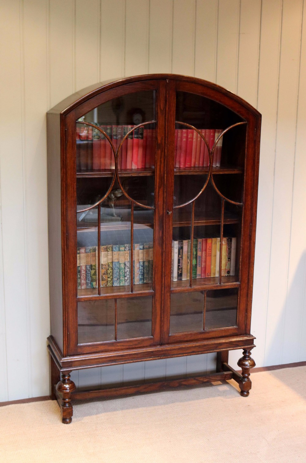 Oak Arch Top Glazed Bookcase 