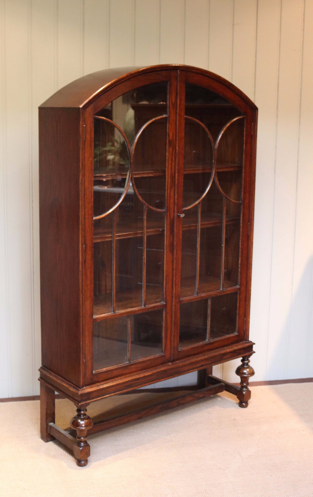 Oak Arch Top Glazed Bookcase  View IV