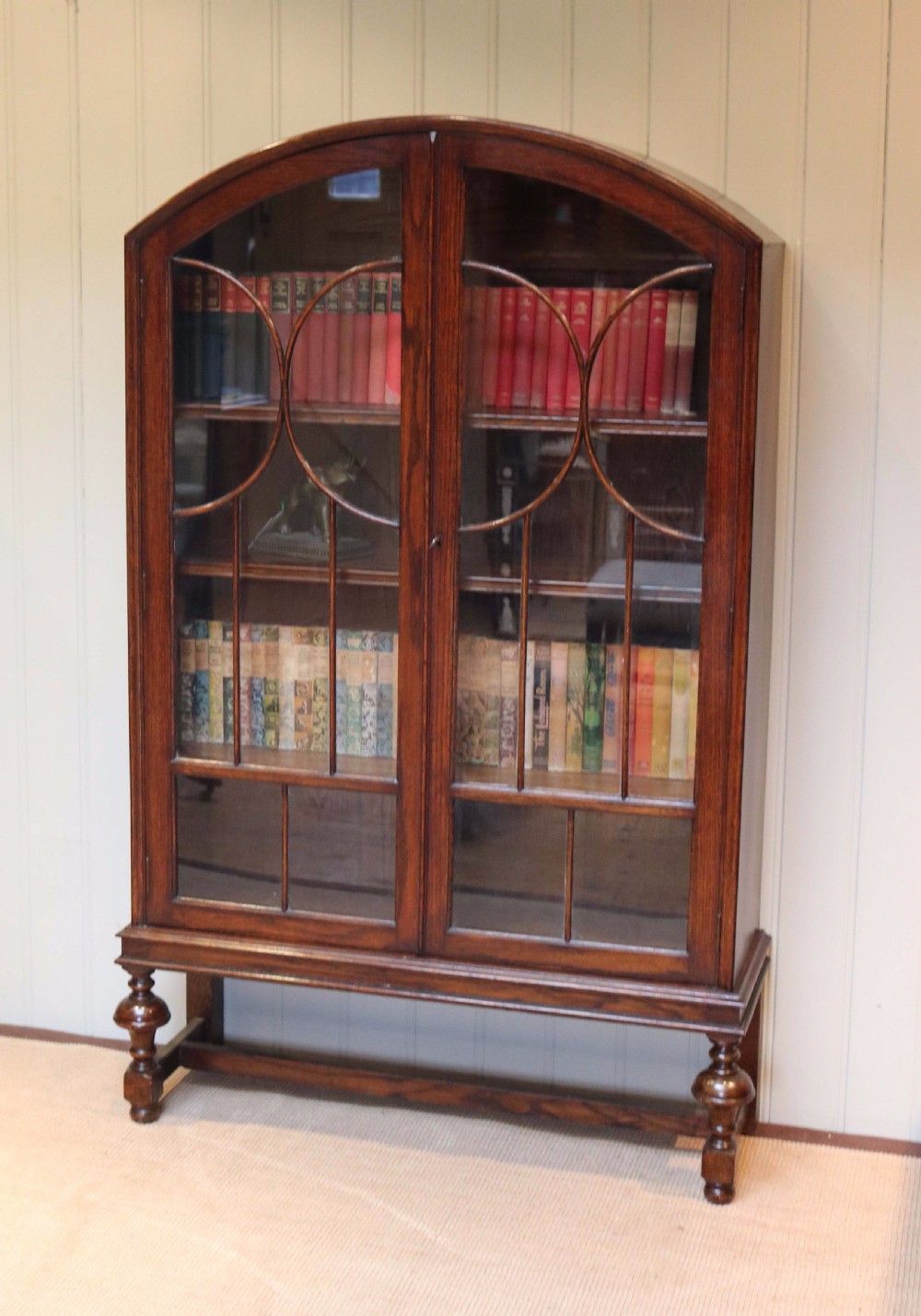 Oak Arch Top Glazed Bookcase  View VII