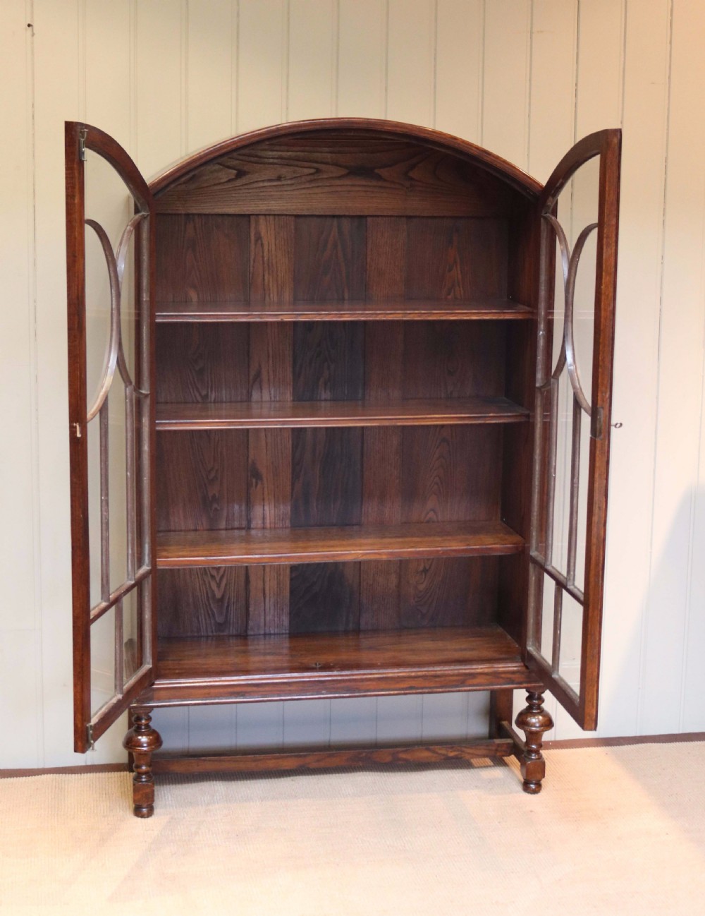 Oak Arch Top Glazed Bookcase  View VIII