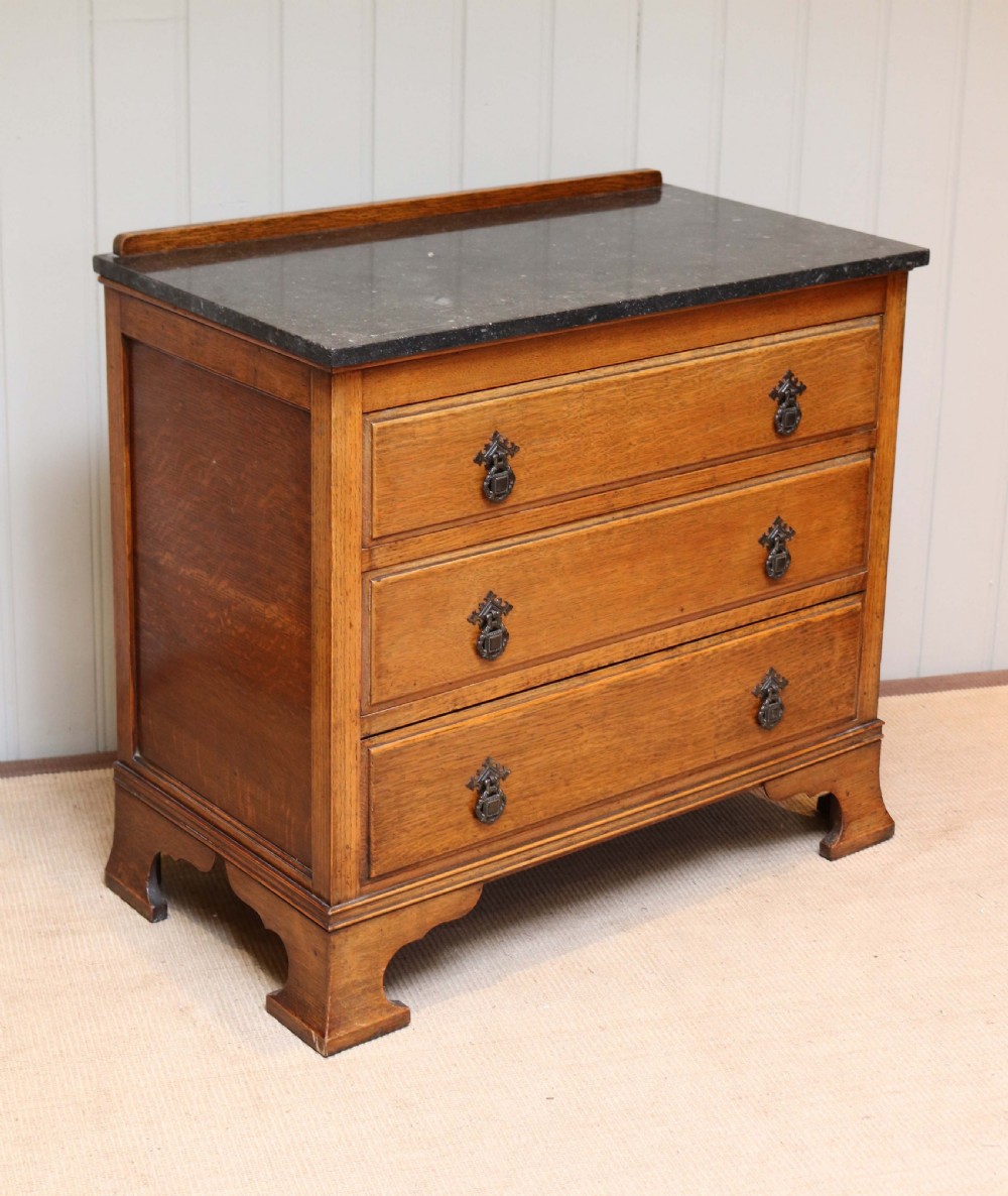 Small Proportioned Oak Marble Top Chest View VI