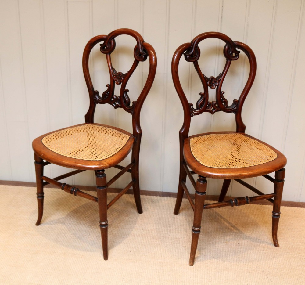 Pair Of Victorian Walnut Cane Seat Chairs  View VI