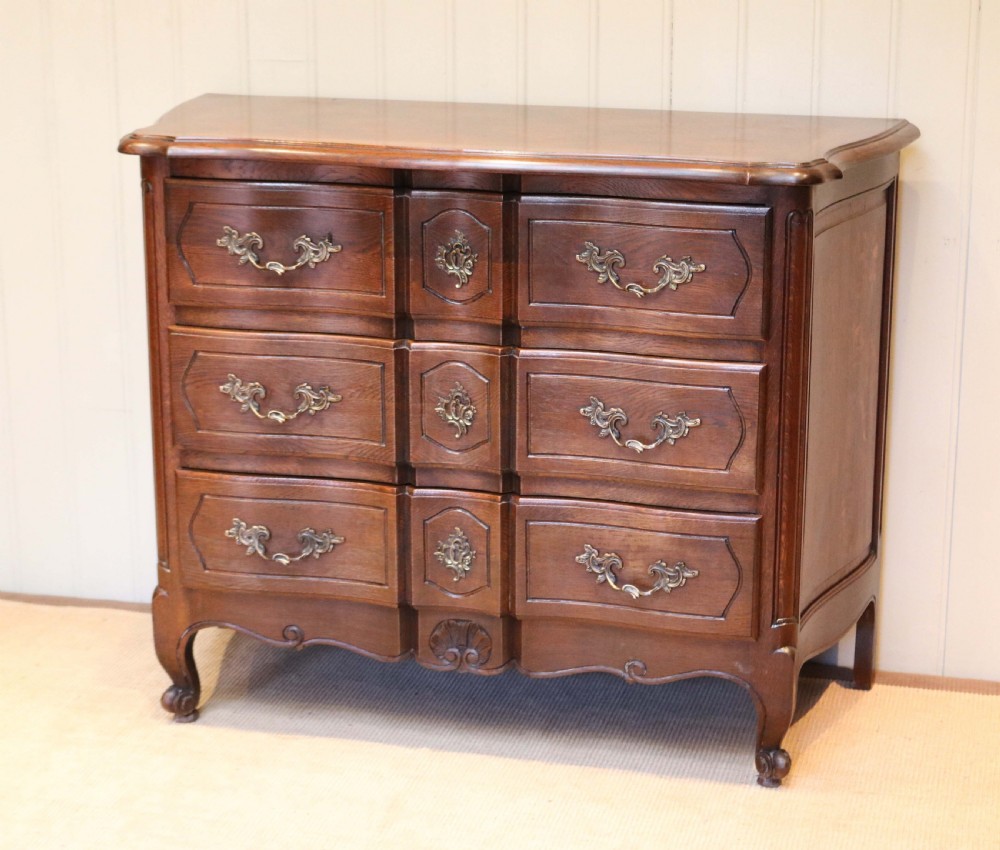 French Oak Serpentine Chest Of Drawers View II