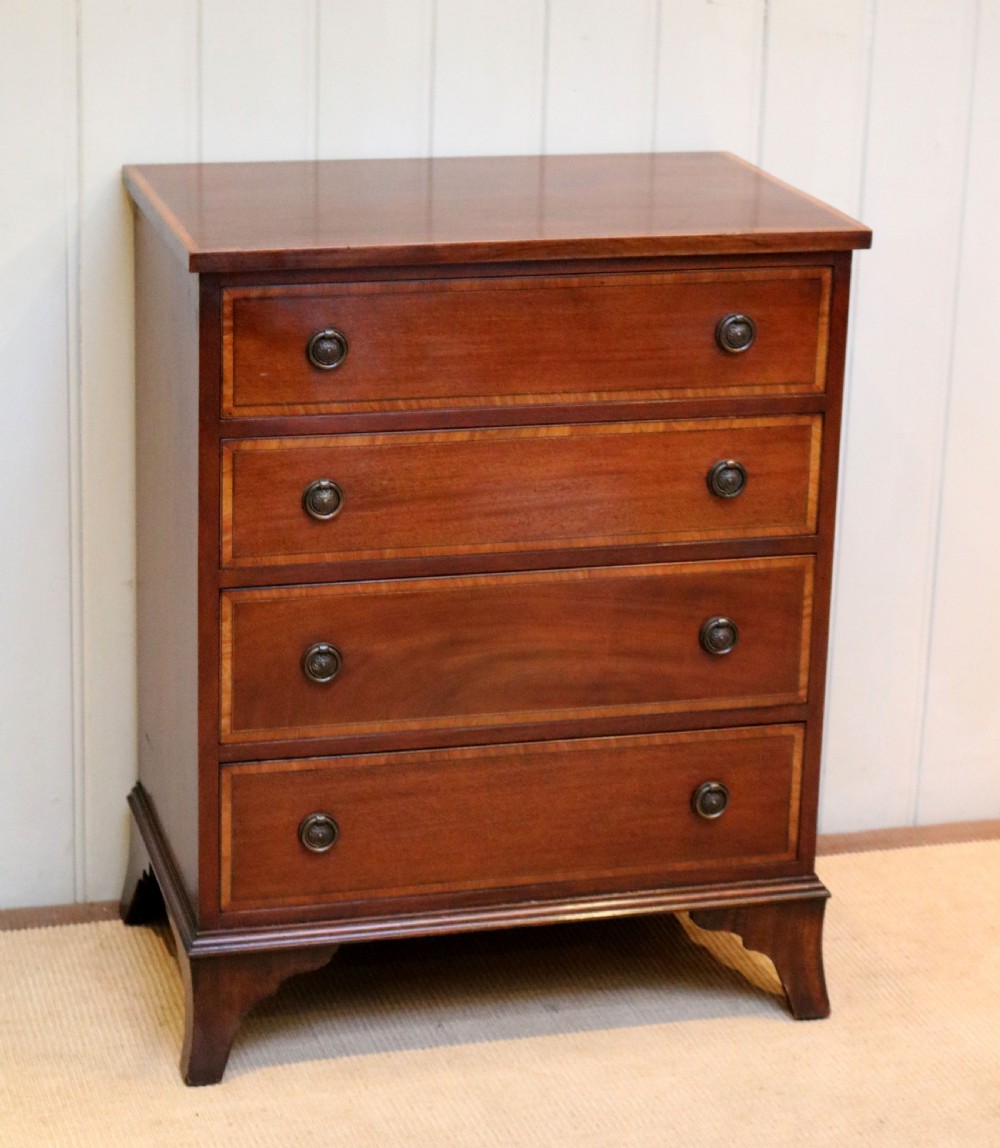 Inlaid Mahogany Chest Of Drawers 
