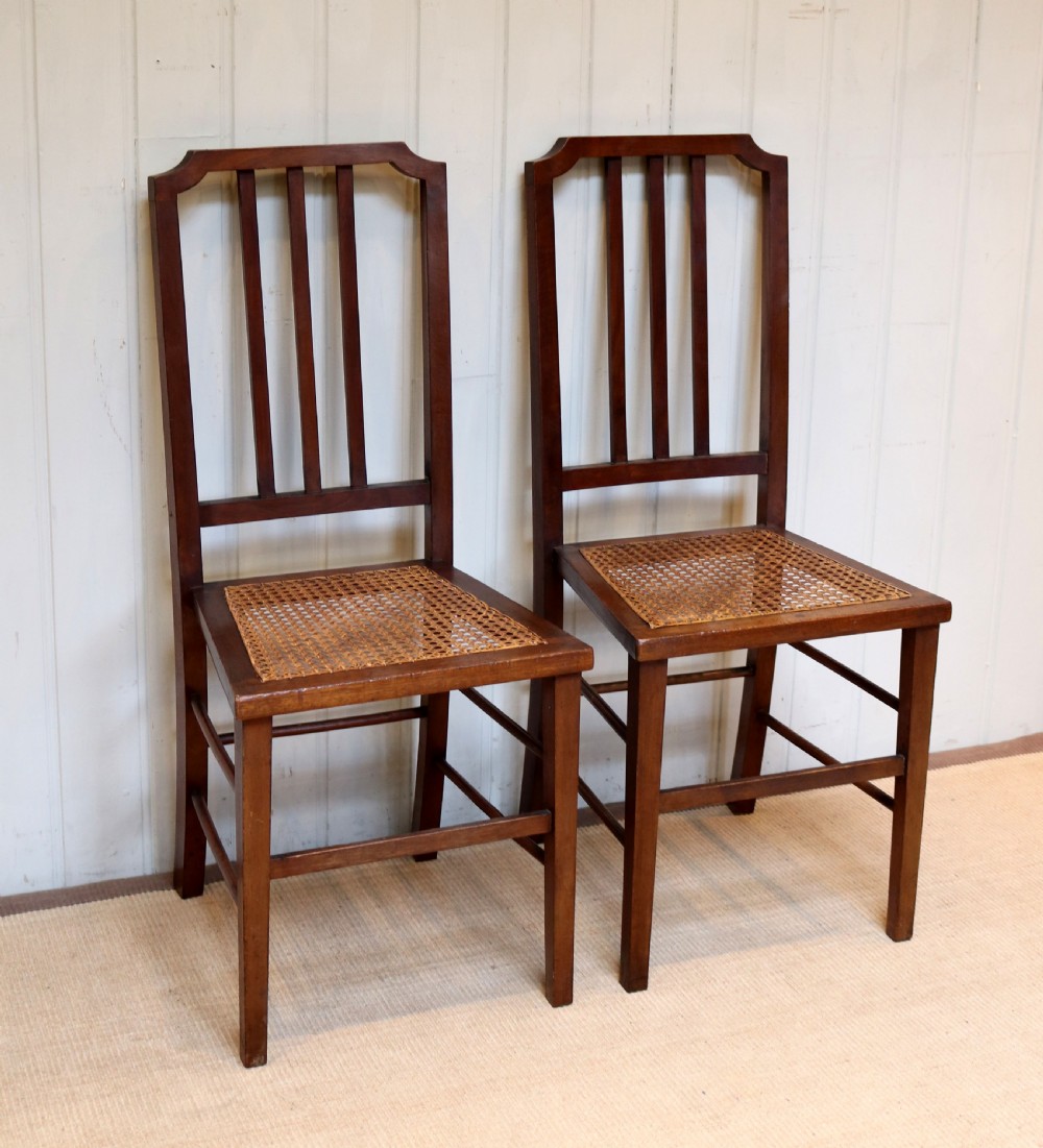 Pair Of Mahogany Cane Seat Chairs