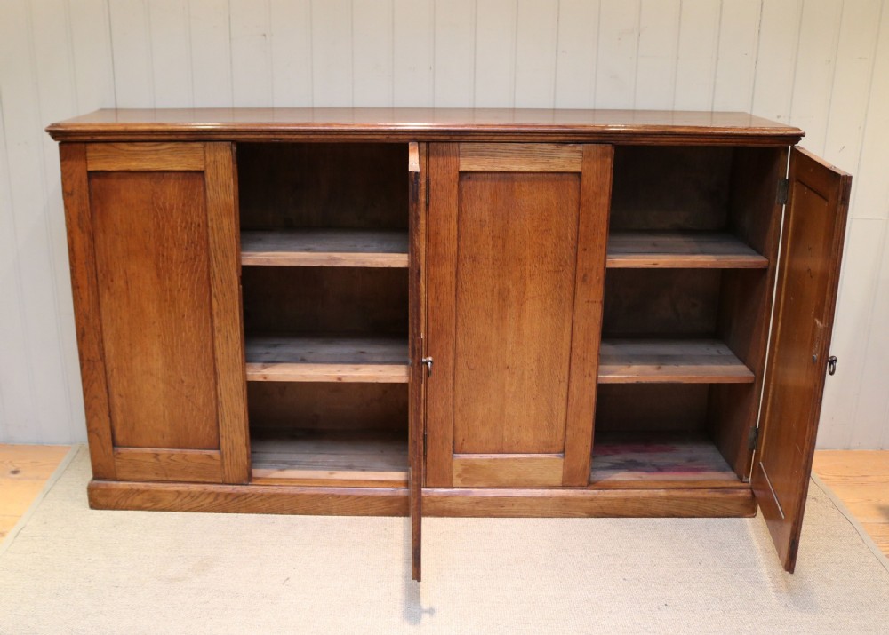 Substantial Oak Four Door Sideboard View VII