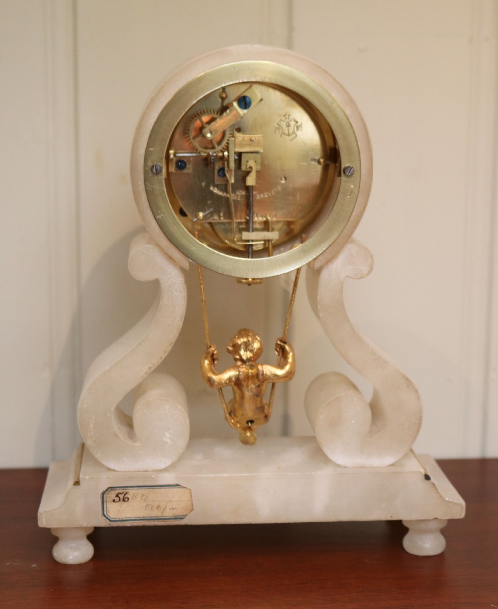 Swinging Cherub Mantel Clock View VI