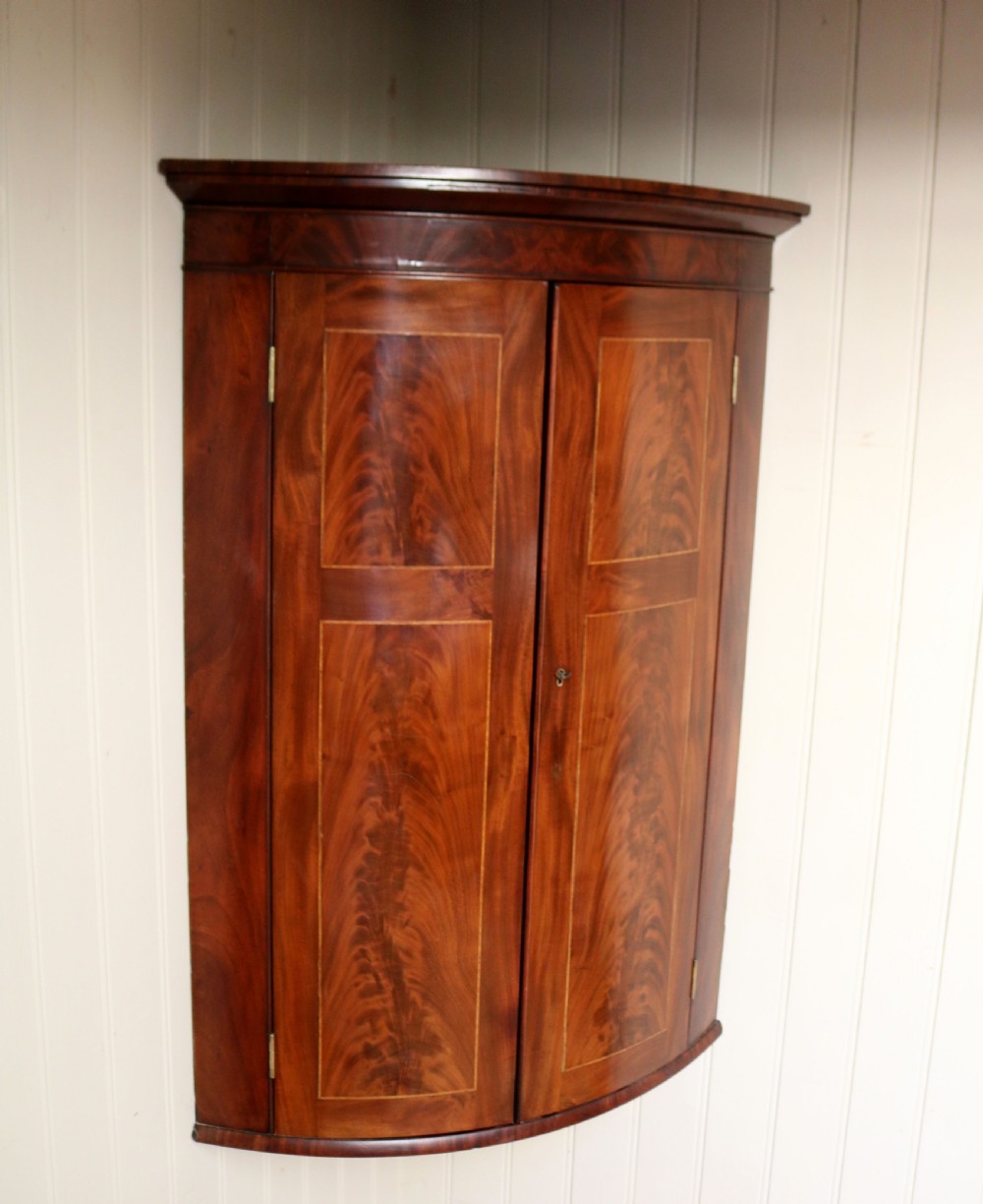 Early 19th Century Mahogany Bow Front Corner Wall Cabinet
