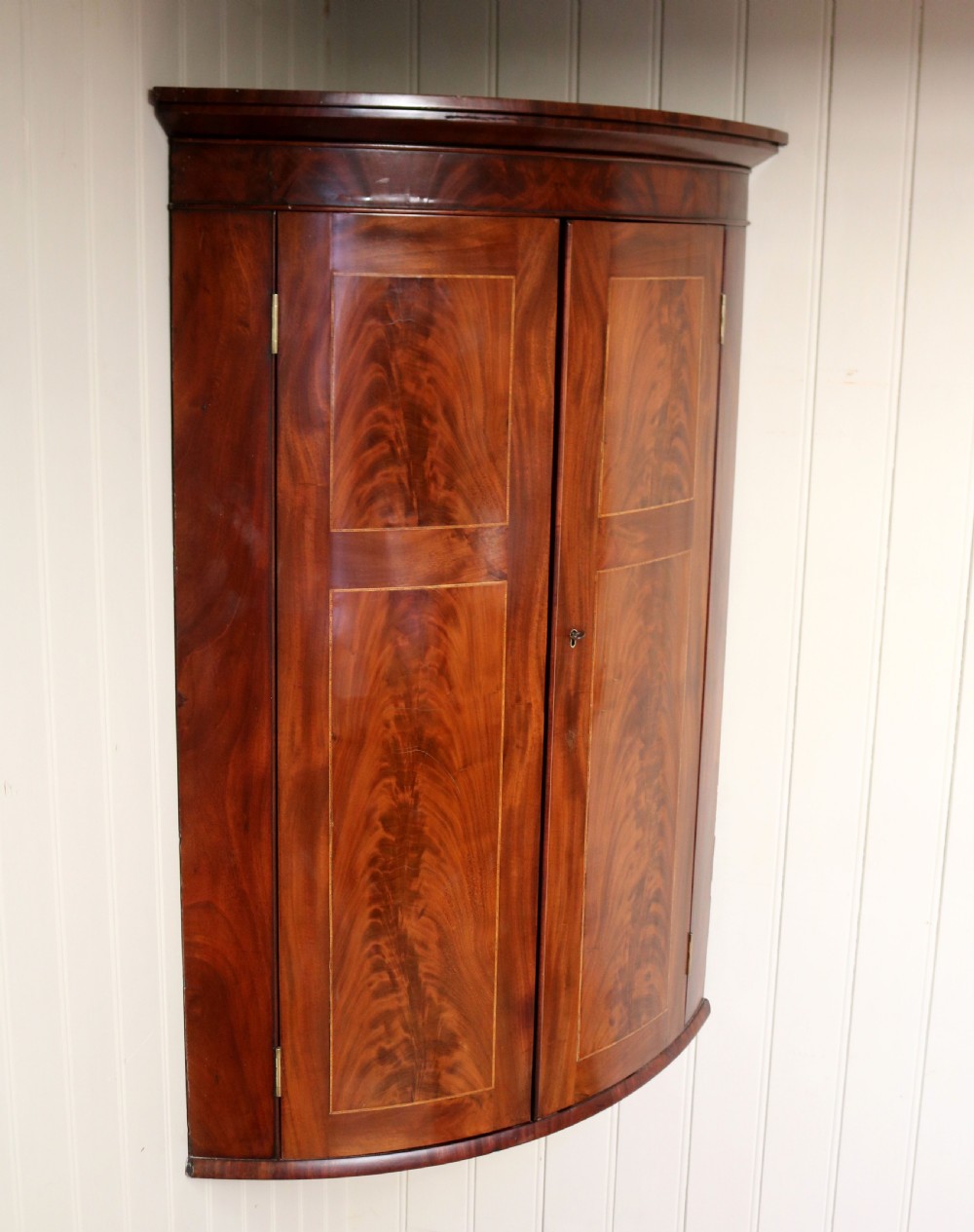 Early 19th Century Mahogany Bow Front Corner Wall Cabinet View V