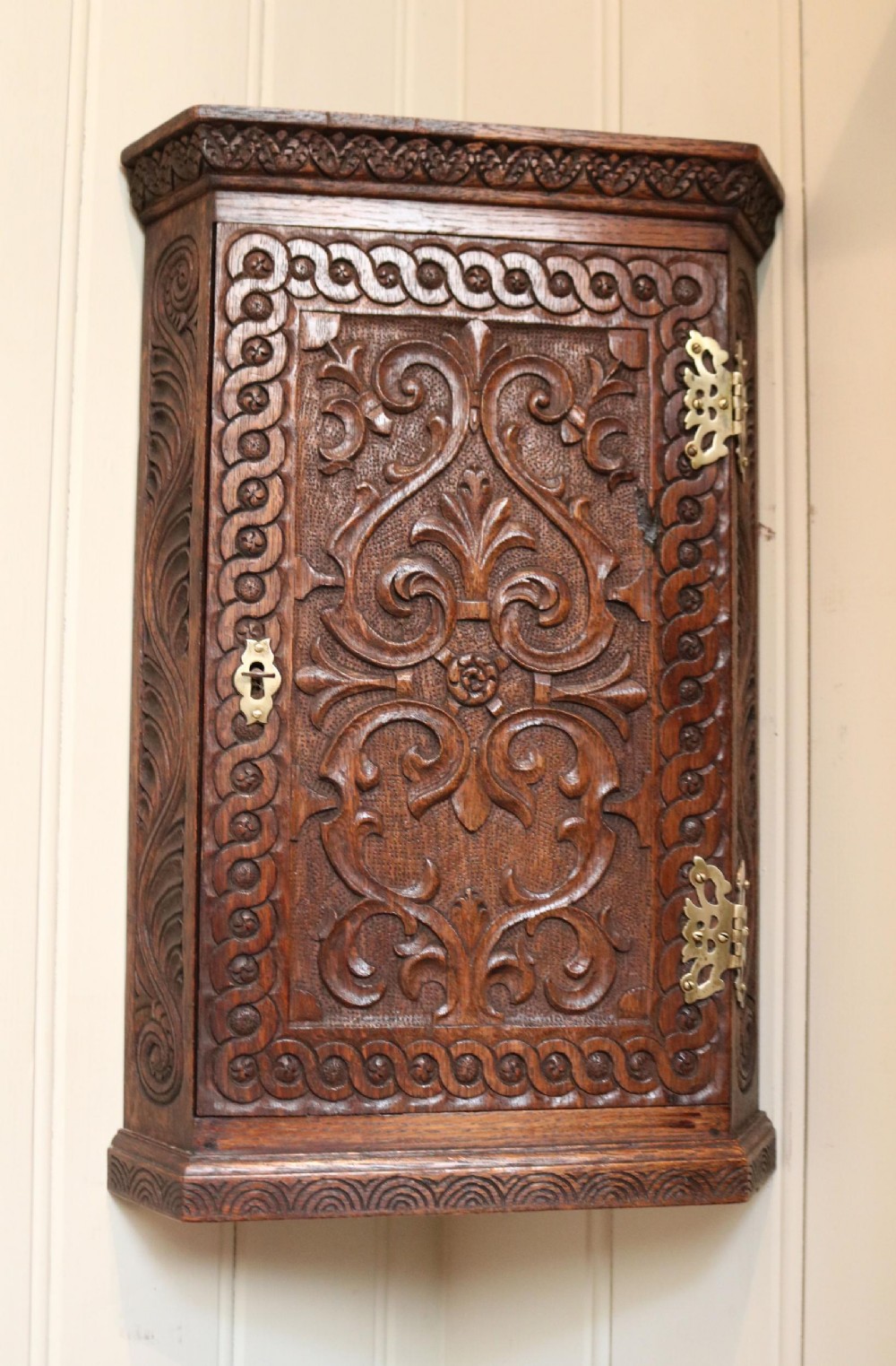 Mid 19th Century Carved Oak Corner Wall Cabinet