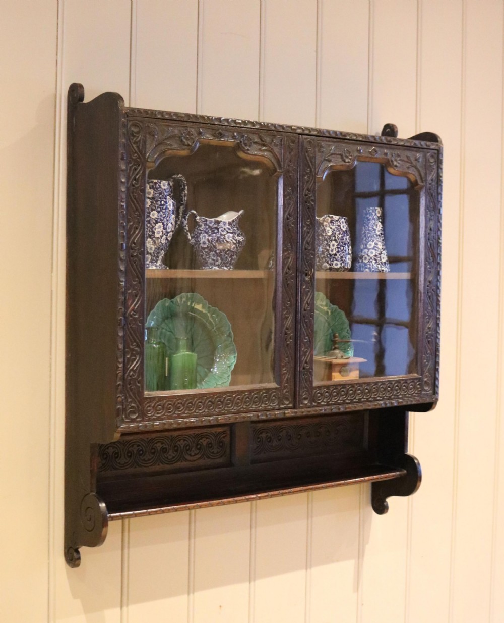 Carved Dark Oak Wall Cabinet
