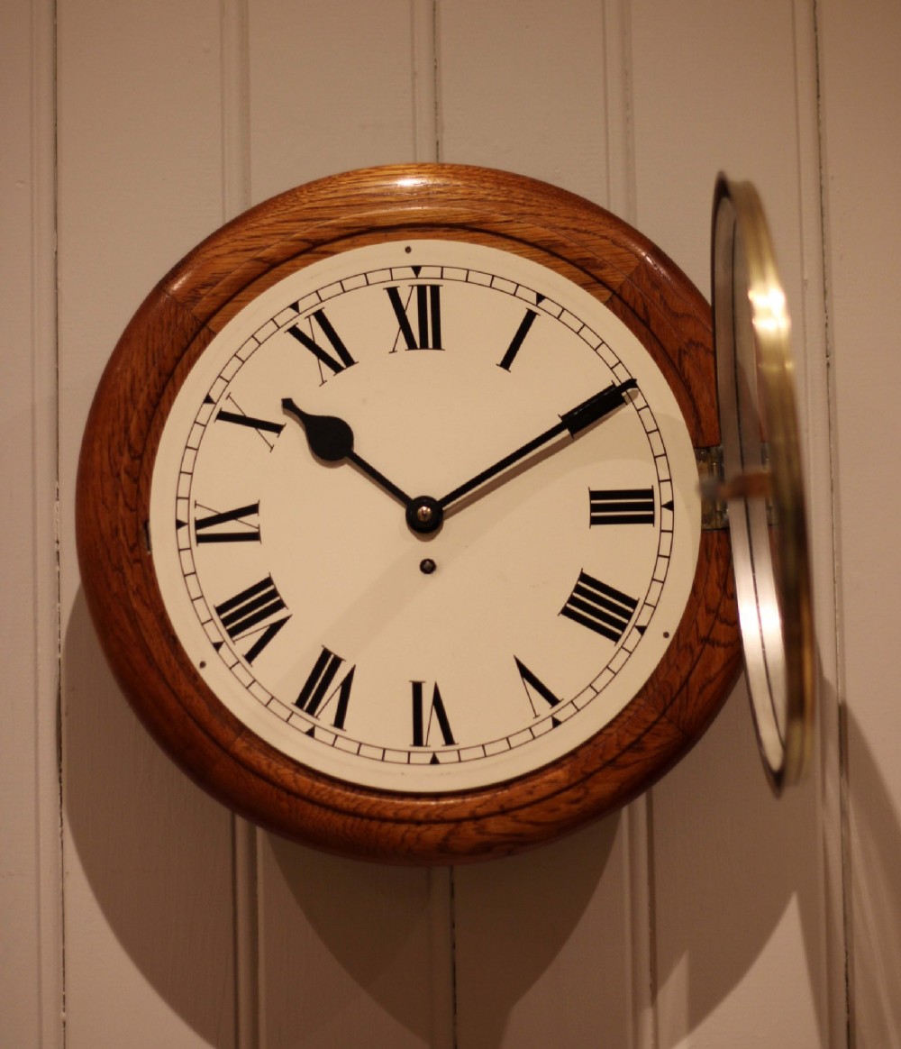Early 20th century Oak Dial Clock View IX