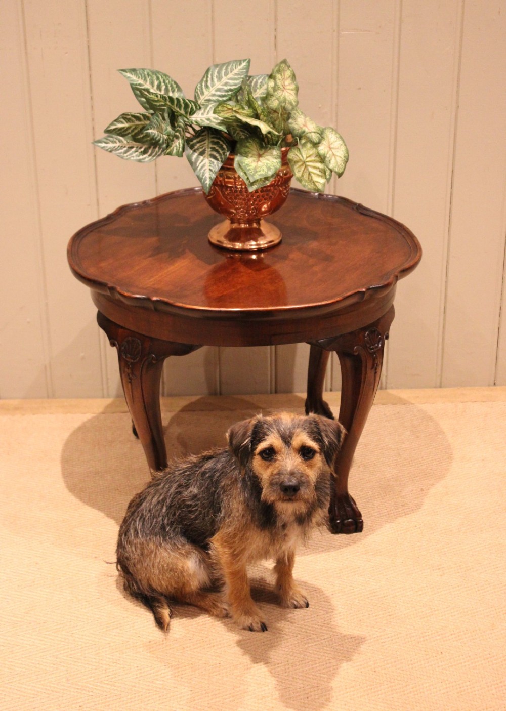 A low mahogany coffee table featuring a shaped piecrust rim, carved cabriole legs with shell knee detailing, and claw and ball feet. View XI