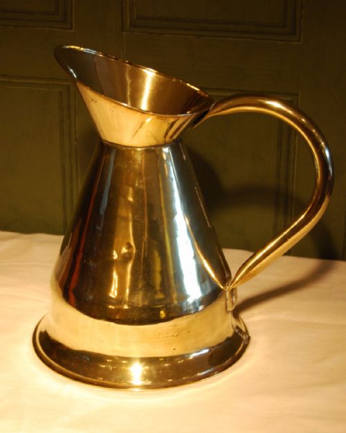 A Large Brass Pitcher