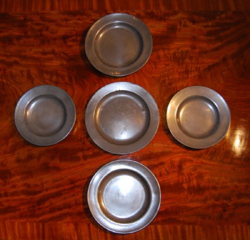 A Collection of Five Late 18th. Century Pewter Plates