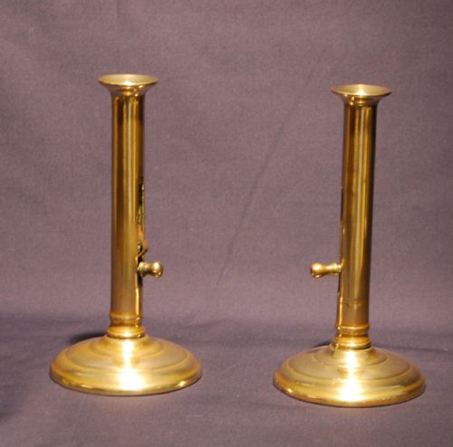 Pair of George II Side Ejector Brass Candlesticks