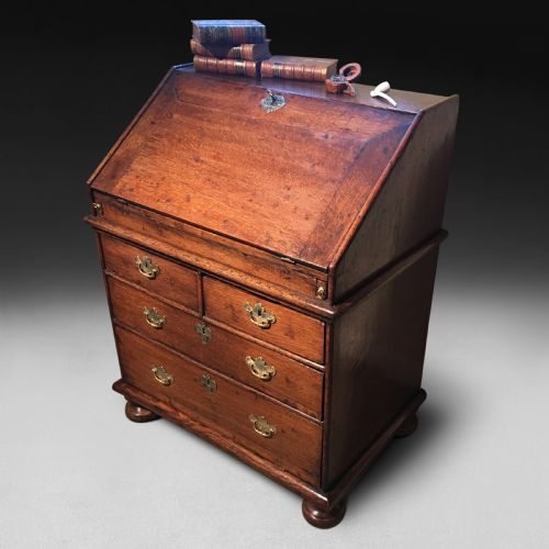 A Charming and Small Queen Anne Period Oak Bureau