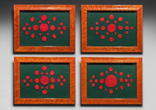 Decorative Collection of 19th Century Red Seals Mounted in 4 Frames, 84 in Total
