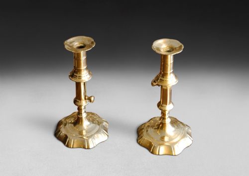 Pair of Early 18th. Century Petal Base Brass Candlesticks with Side Ejectors