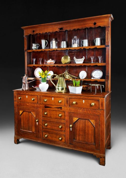An Early 19th. Century Oak and Inlaid Dresser and Rack