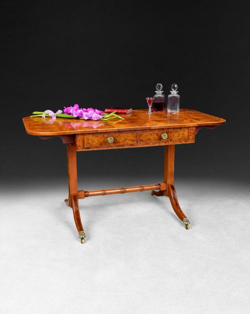 An Early 19th Century Burr Yew Veneered and Rosewood Cross Banded Drop Leaf Sofa Table,