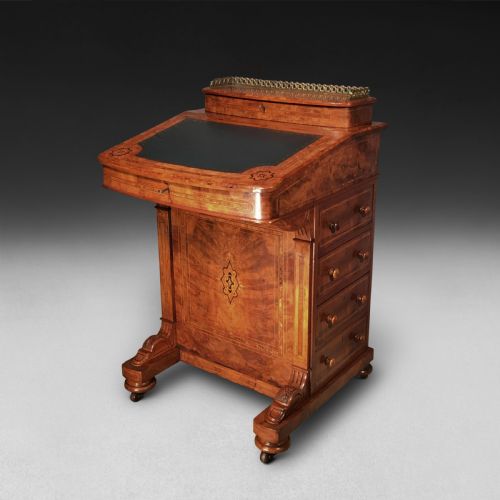 A Victorian Inlaid Walnut and Crossbanded Davenport