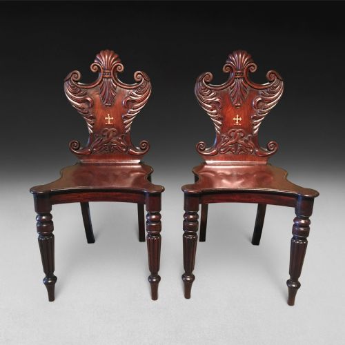 A Pair of Regency Mahogany Hall Chairs