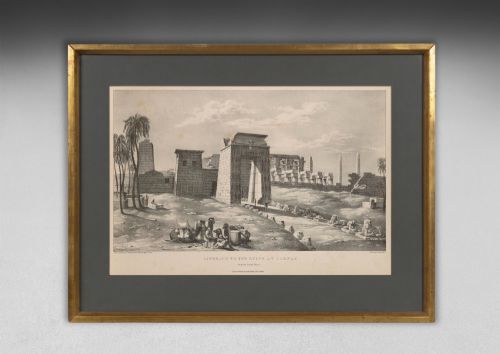 fig 2. A set of eight 19th-century framed lithographs depicting ancient Egyptian temples, monuments, and landscapes, presented in gilt frames with dark grey mounts.