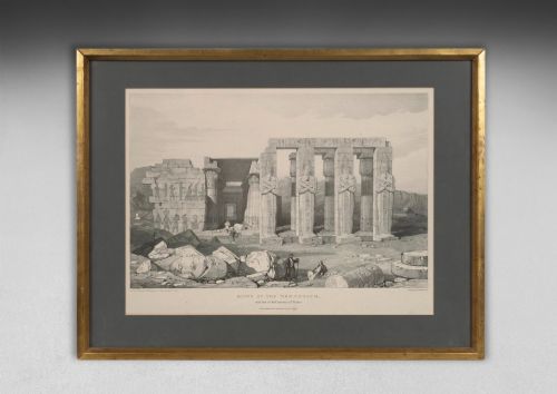 fig 4. A set of eight 19th-century framed lithographs depicting ancient Egyptian temples, monuments, and landscapes, presented in gilt frames with dark grey mounts.
