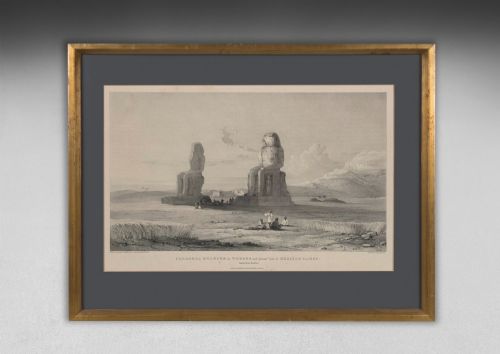 fig 5. A set of eight 19th-century framed lithographs depicting ancient Egyptian temples, monuments, and landscapes, presented in gilt frames with dark grey mounts.