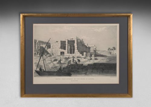 fig 6. A set of eight 19th-century framed lithographs depicting ancient Egyptian temples, monuments, and landscapes, presented in gilt frames with dark grey mounts.