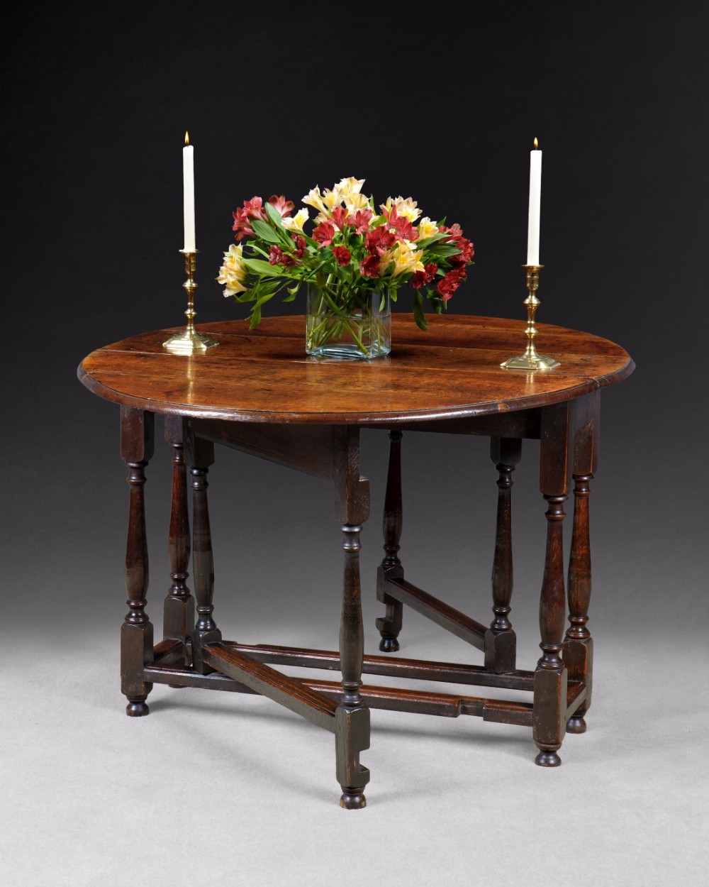 Queen Anne Period Oak Gate-legged table.