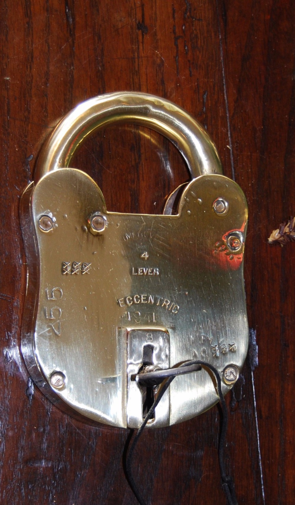 A massive Solid Brass Munitions Padlock and Key in perfect working condition