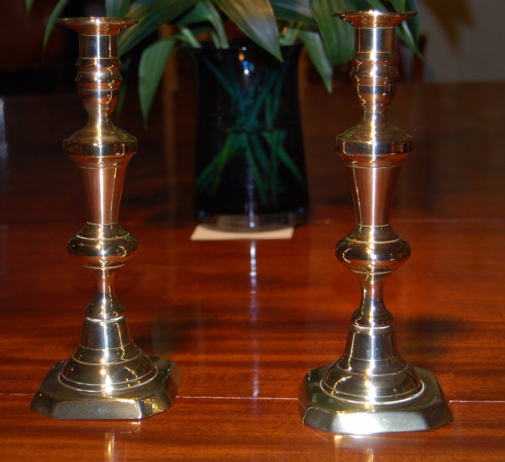 Pair of mid 19th. century Brass ejector candlesticks